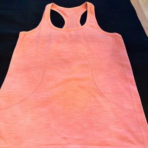 Lululemon racerback. Size 8. Peach marled. Lightweight stretch.